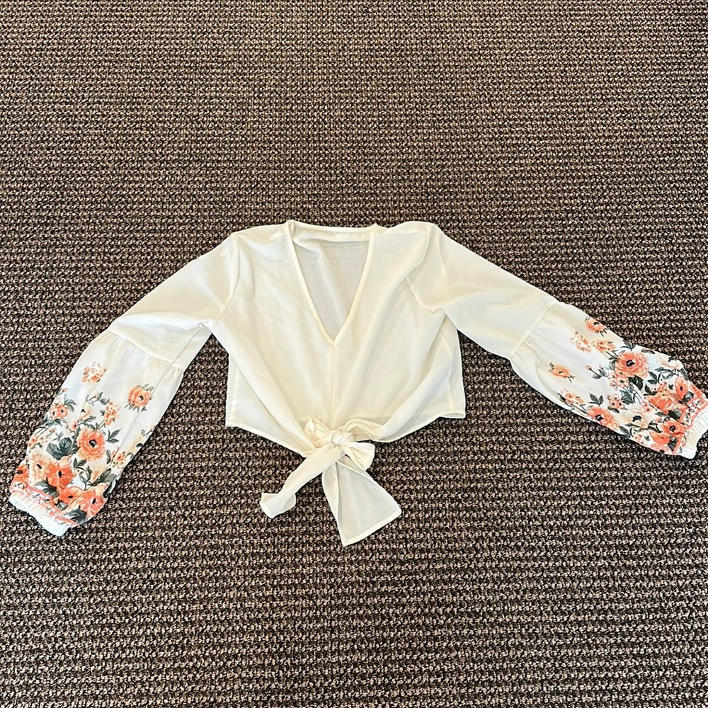 This cute Blouse is from SHEIN. It’s very comfortable. Looks great with jeans!